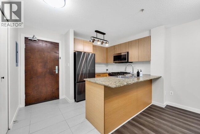 Photo du bâtiment - 5889 Irmin St