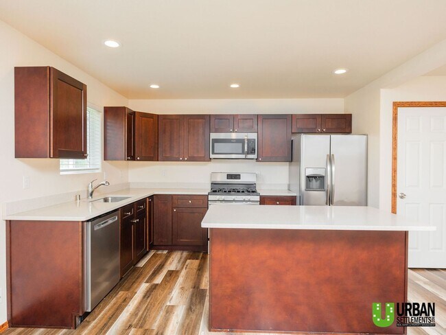 Foto del edificio - 5517-5519 E 14th Ave