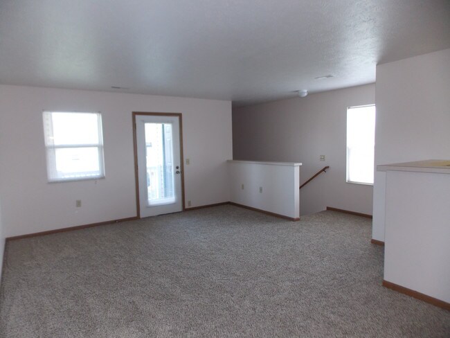 Sala de estar en planta superior - Arbors at Lakeside