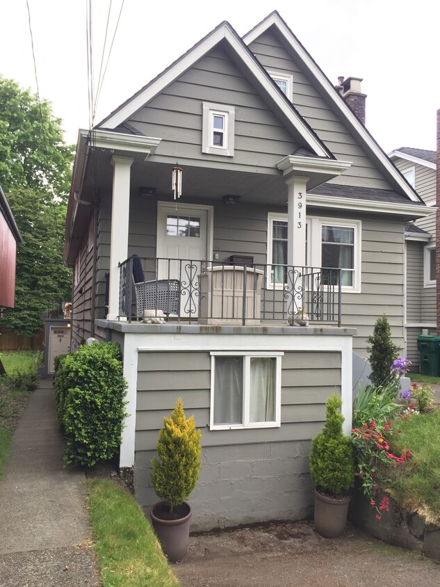 Basement Apartment Entrance is on the Left Side of the House - 3913 Densmore Ave N