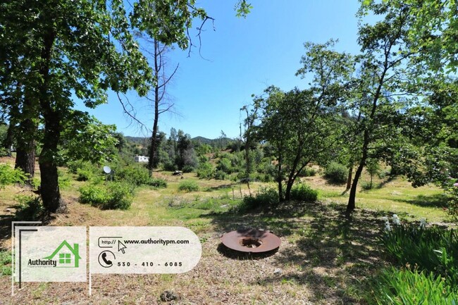 Building Photo - 15095 Rock Creek Rd. Pets Considered with ...