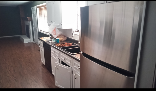 Kitchen looking into Dining area & Family Room - 1106 Maria Dr