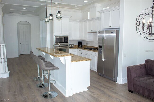 Foto del edificio - 4 br, 3.5 bath House - 1016 Castle Pines Ct