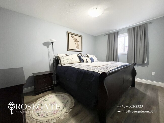 Photo du bâtiment - Pet-Friendly 2-Bedroom Main Level Apartment with Pool & Backyard Deck – Niagara Falls