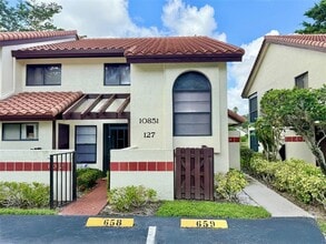 Building Photo - 10851 Palm Lake Ave