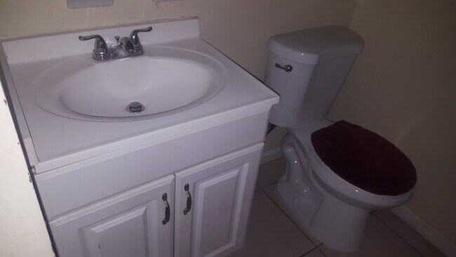Bathroom sink and commode - 390 S 7th St