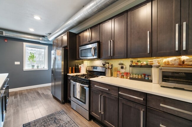 Building Photo - MASSIVE MODERN RENOVATION WITH OPEN LAYOUT...