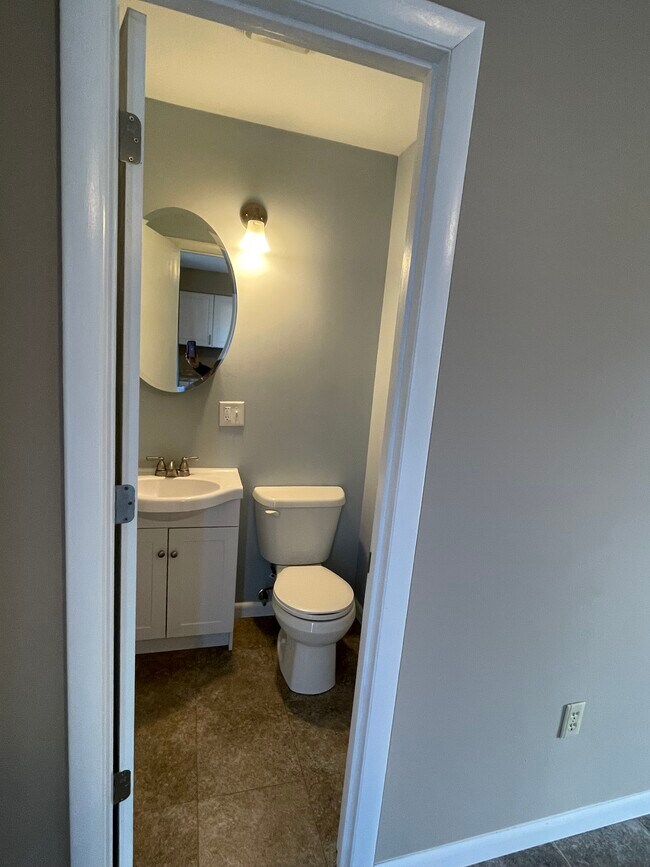 1/2 bath off kitchen - 724 W 2nd St