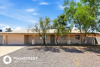 Building Photo - 6231 W Highland Ave