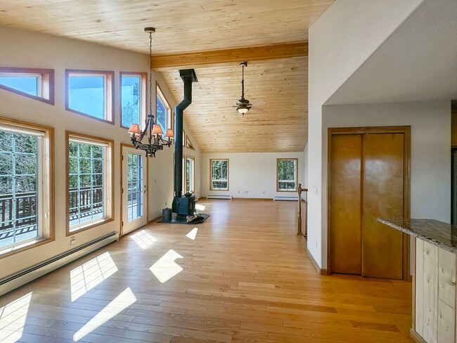 Building Photo - 2.5 Acres! 3 car garage! Two living spaces!