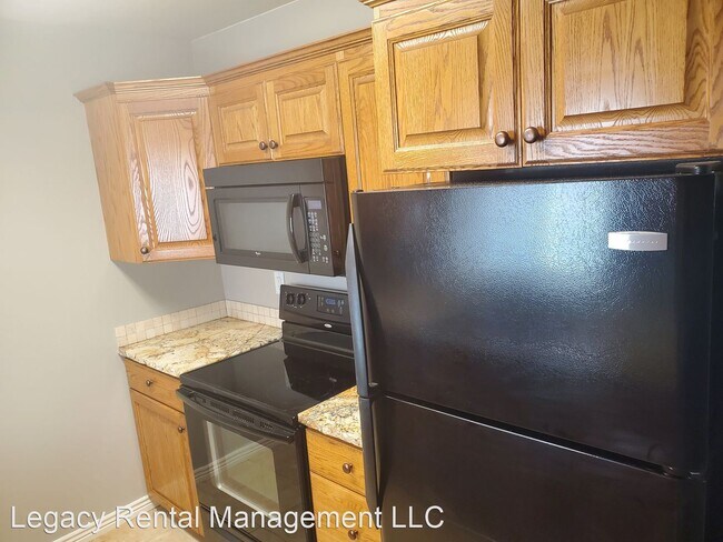 Building Photo - 2 br, 1 bath House - 215 W Center St. #7