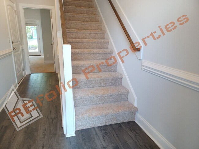 Building Photo - Built in 2022! 3 Story 3 Bedroom 1-Car Gar...