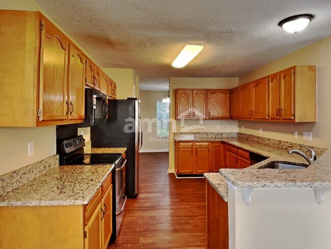 Building Photo - 7117 Daerwood Pl