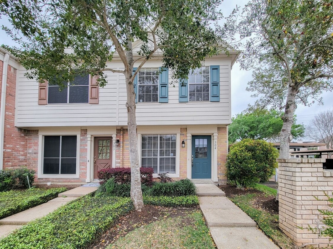 Primary Photo - Welcome to This Charming Townhome Nestled ...