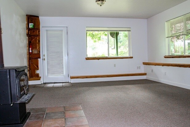living three large windows - 23516 N Lake Cochran Rd