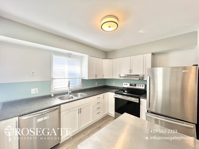 Building Photo - Spacious 3-Bedroom Main-Level Unit – 1,250...