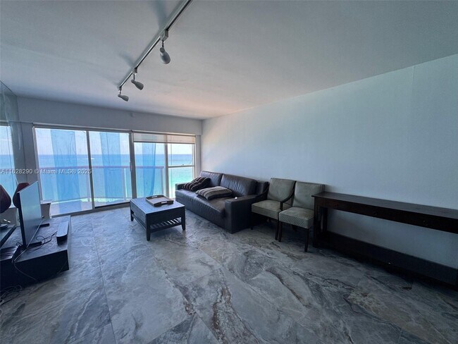Building Photo - 6767 Collins Ave