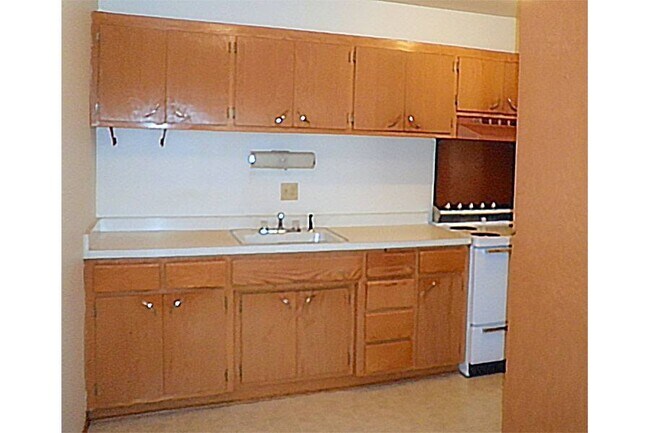 Foto del edificio - EXECUTIVE HOUSE APARTMENTS
