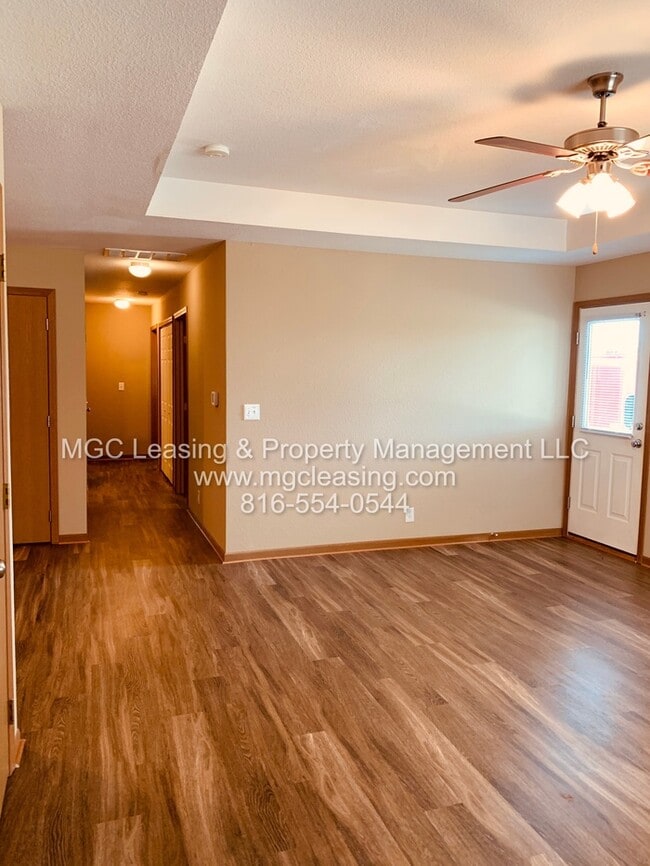 Building Photo - Charming Brick Ranch Duplex in the Heart of Lone Jack - Ready Now