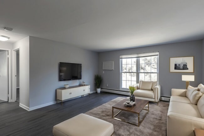Bright, Spacious Living Rooms at The Boulders - The Boulders Apartments