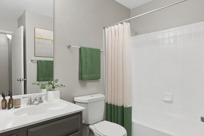 A renovated bathroom with low-flow toilet and upgraded countertops is shown. - ReNew Holiday Hill®