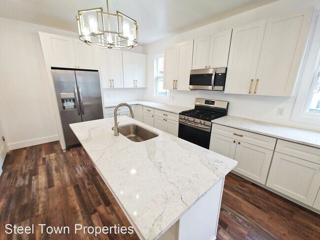 Foto del edificio - 3 br, 2.5 bath House - 609 E. 14th St.