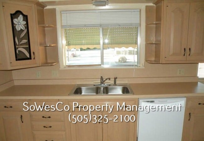 Building Photo - Three Bedroom Two Bath Home with Two Car Garage