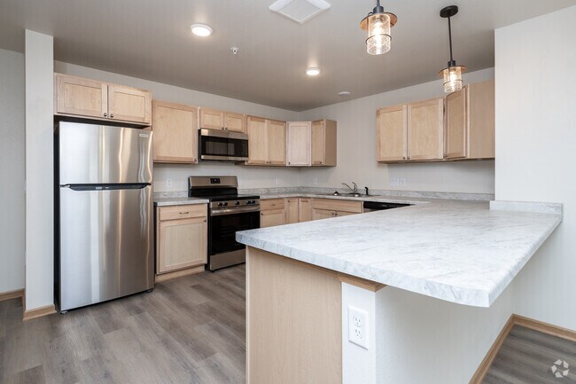 3BR, 2BA - Kitchen - Meadowlark Eco Apartments