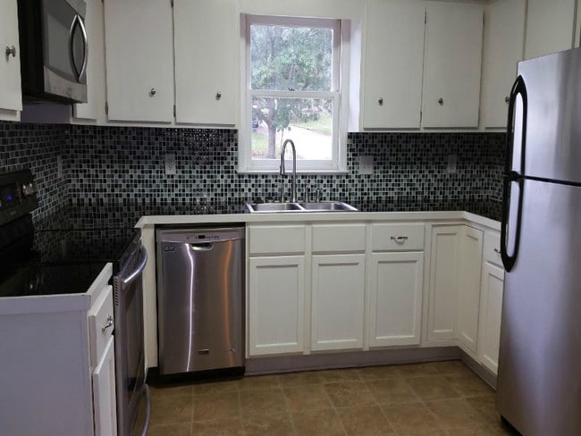 Building Photo - 6521 Lemans Ln