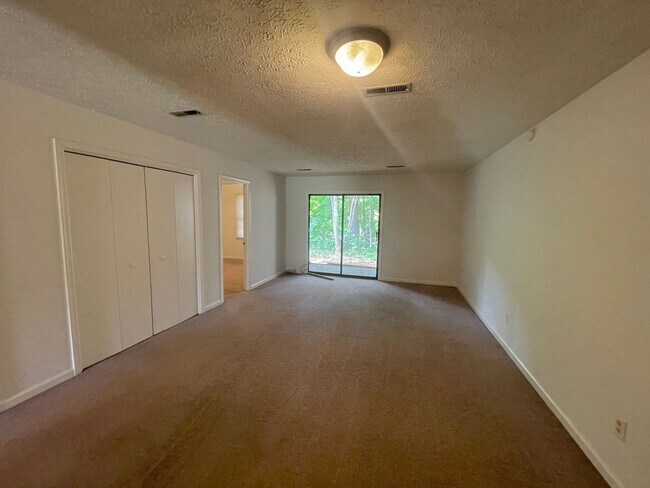 Building Photo - One Level Duplex Apartment