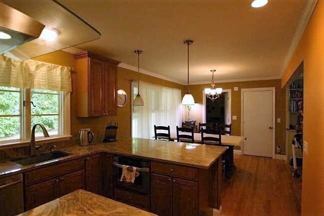 kitchen open into dining room - 61 Cornell Blvd