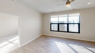 This 1350 square foot apartment in Cedar Rapids offers a harmonious blend of space and contemporary design. The single-bedroom unit boasts a generous 260 square feet, providing ample room for relaxation. The open floor plan seamlessly integrates the living room and kitchen, creating a spacious feel throughout.

The modern kitchen is a highlight, featuring crisp white cabinetry, stainless steel appliances, and a sleek design that maximizes functionality. It includes a built-in microwave, electric range, and a French door refrigerator, perfect for culinary enthusiasts.

Large windows in the living area and bedroom flood the space with natural light, offering picturesque views of the surrounding cityscape. The bathroom is well-appointed with a bathtub-shower combination and modern fixtures.

Flooring varies throughout the apartment, with durable laminate in the main living areas and plush carpeting in the bedroom, adding comfort and style. The unit also features recessed lighting and a modern ceiling fan for optimal climate control.

This apartment combines the convenience of urban living with the comfort of a well-designed, spacious interior, making it an ideal residence for those seeking a contemporary lifestyle in the heart of Cedar Rapids.