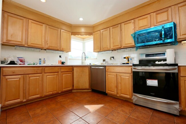 Lovely kitchen complete with stainless steel appliances, tons of counter & cabinet space! - 4128 14th Ave S