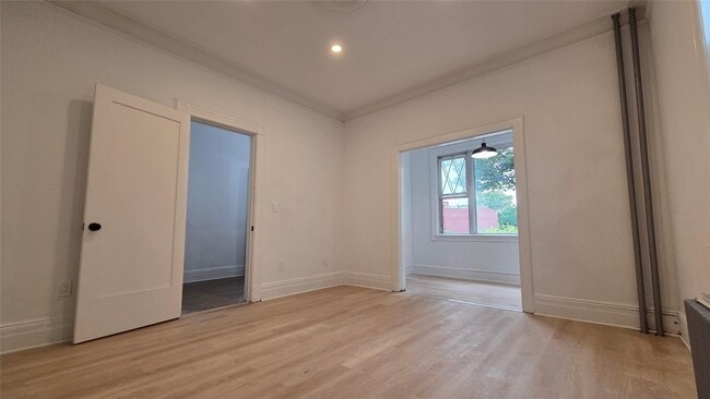 Building Photo - 42-21 65th Pl