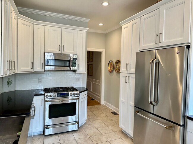 Building Photo - SPACIOUS 3 BED BROWNSTONE with PARKING, YARD and 2 DECKS!