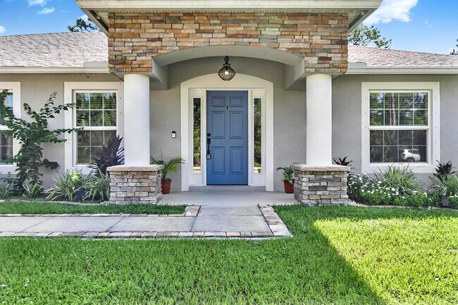 Building Photo - Modern 4-Bedroom, 3-Bath Home with Private In-Law Suite – Palm Coast, FL