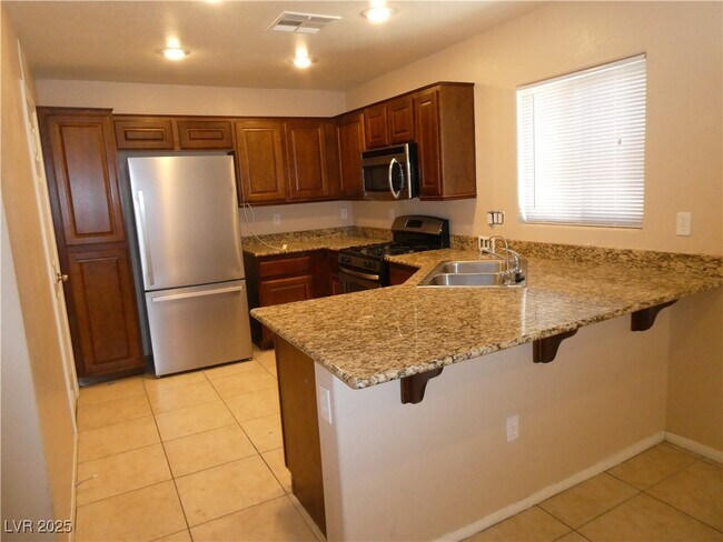 Foto del edificio - 6504 Blessed Thistle Ave
