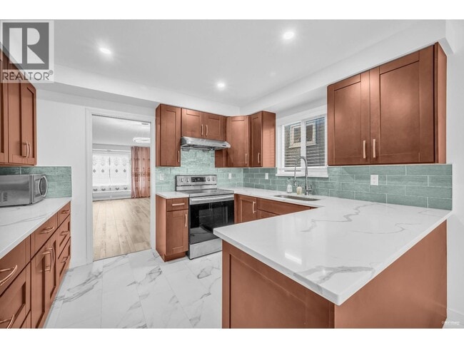 Photo du bâtiment - 62 W 63rd Ave