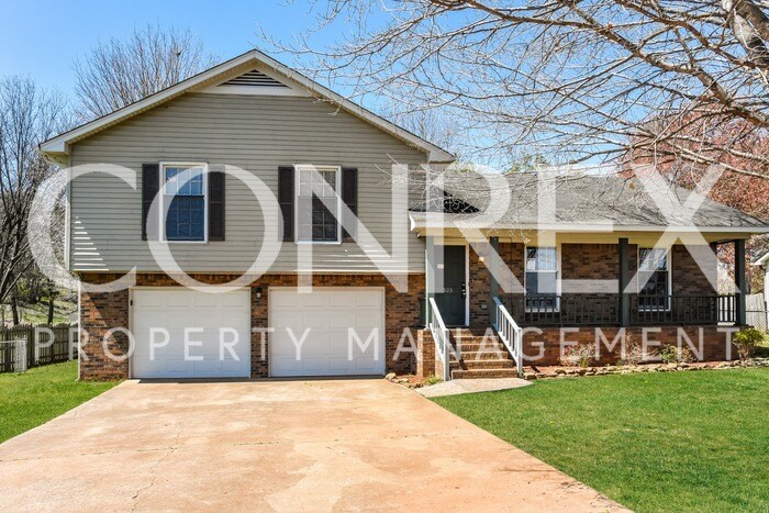 Primary Photo - Curb appeal with a huge backyard!