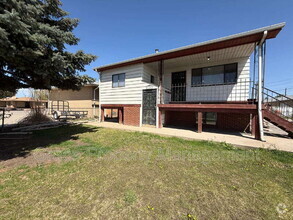 Building Photo - 1149 E 58th Ave
