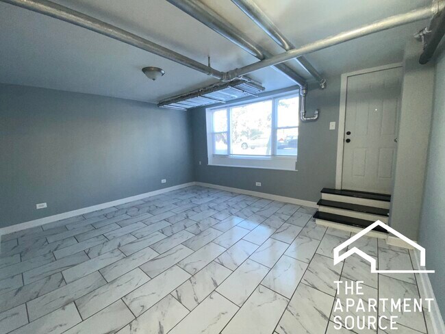 Foto del edificio - 5664 N Ridge Ave