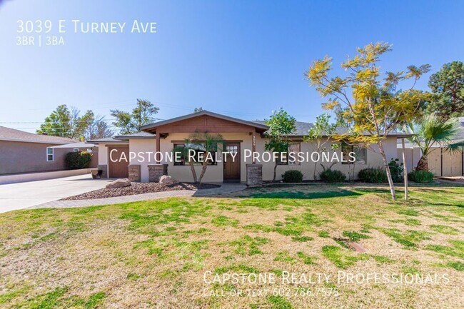 Building Photo - Beautiful 3 bedroom plus den, server area,...