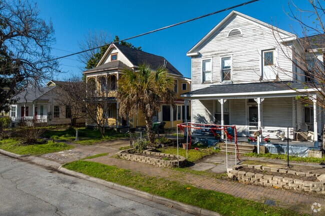 Exploring the charming streets reveals meticulously preserved historic bungalows in Sixth Ward.