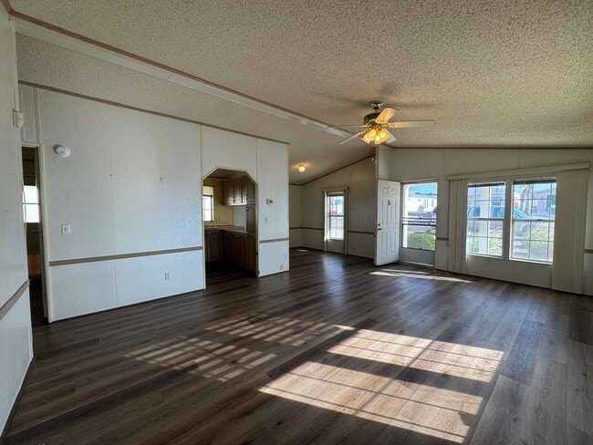 Building Photo - Sunrise Vista -2 Br, 2Ba home with covered carport, fenced yard, storage