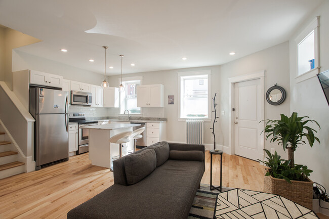 Open concept kitchen and living area - 127 Cumberland Ave