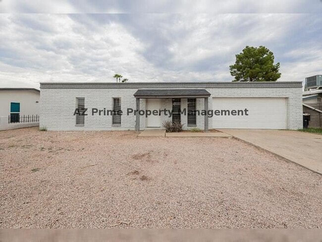Building Photo - 1838 E Enid Ave