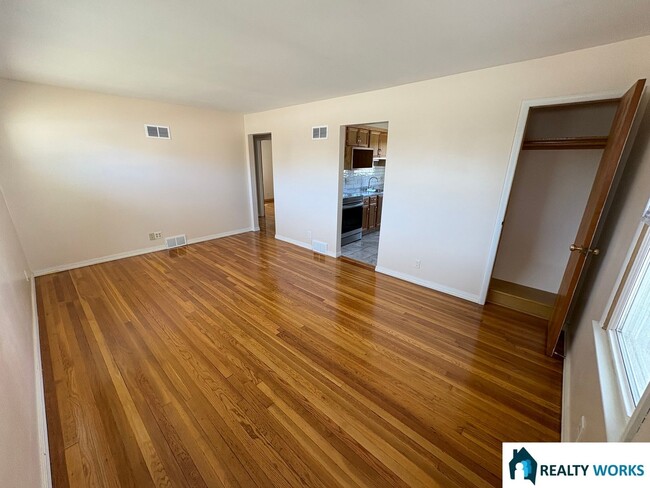 Building Photo - 2-Bedroom Home with Hardwood Floors