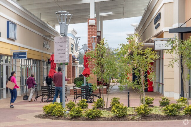 Residents in Woodstock can explore the many fashion retailers at The Outlet Shoppes at Atlanta.