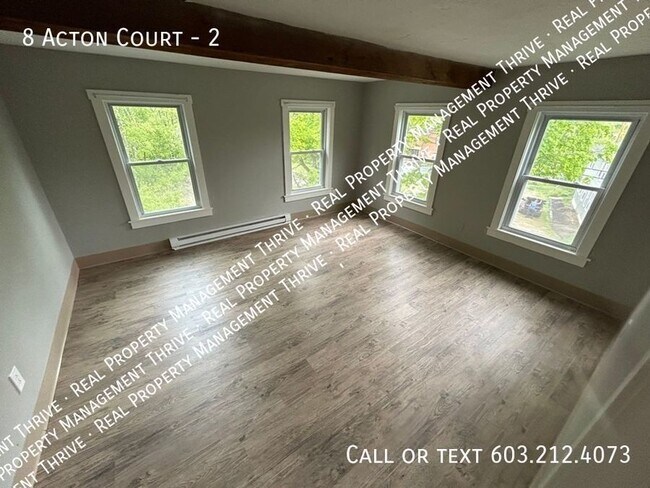 Building Photo - Updated 2nd Floor 2 BR, 1 BA...First Month...