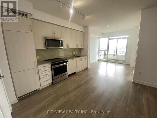 Photo du bâtiment - 4085-4085 Parkside Village Dr